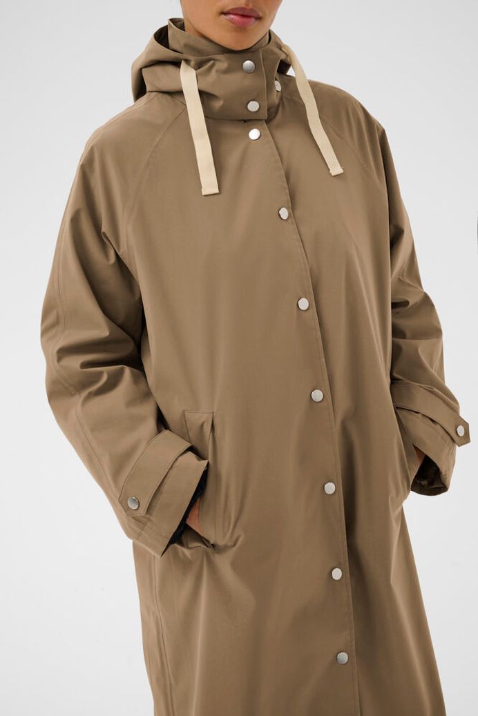 Brown raincoat with a hood on a white background