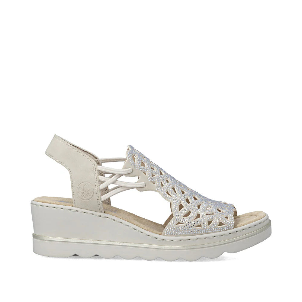 White sandal with cut-out design on a white background